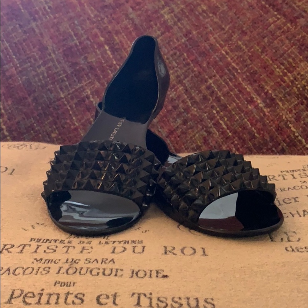 Black jelly flats with spike detailing